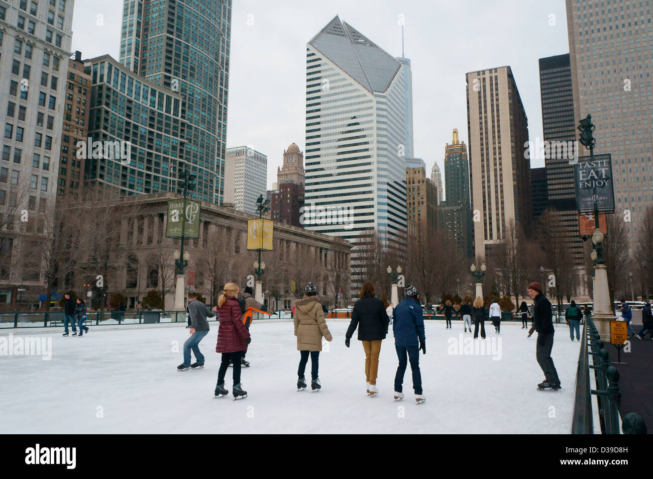Skaters at the McCormick Tribune Ice Rink in Millennium Park, Chicago, Illinois. Stock Photo