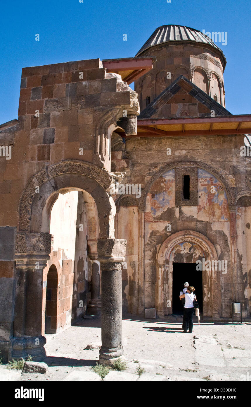 Tourists stand outside the medieval church of St Gregory in the ancient Armenian city of Ani, in eastern Turkey. Stock Photo