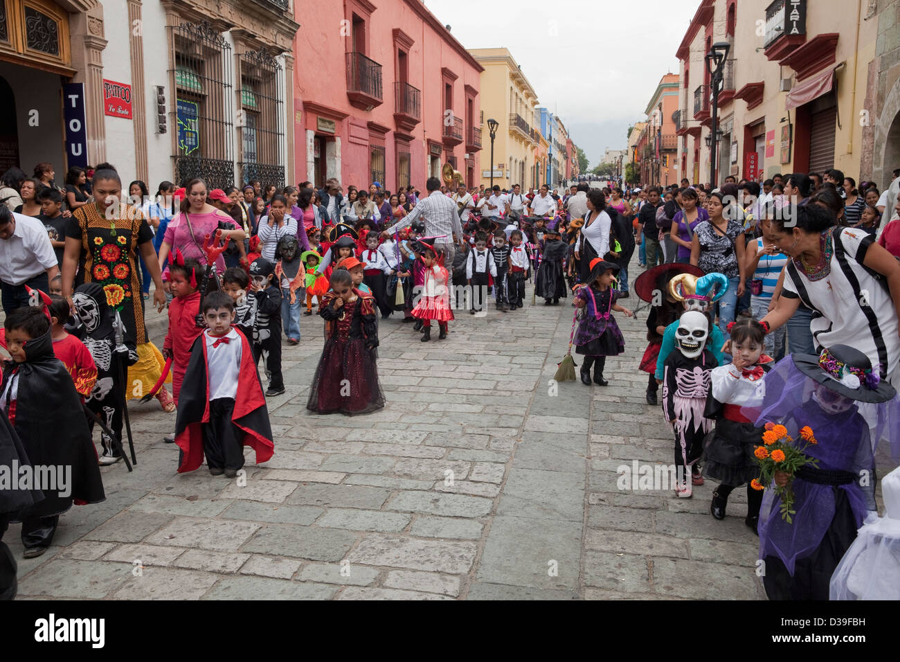 Children's Day of the Dead parade heading for the Zocalo (central plaza) in Oaxaca, Mexico. Stock Photo