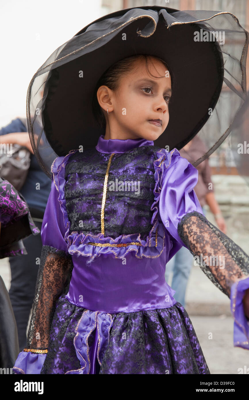 Young girl dressed in costume for Day of the Dead children's parade