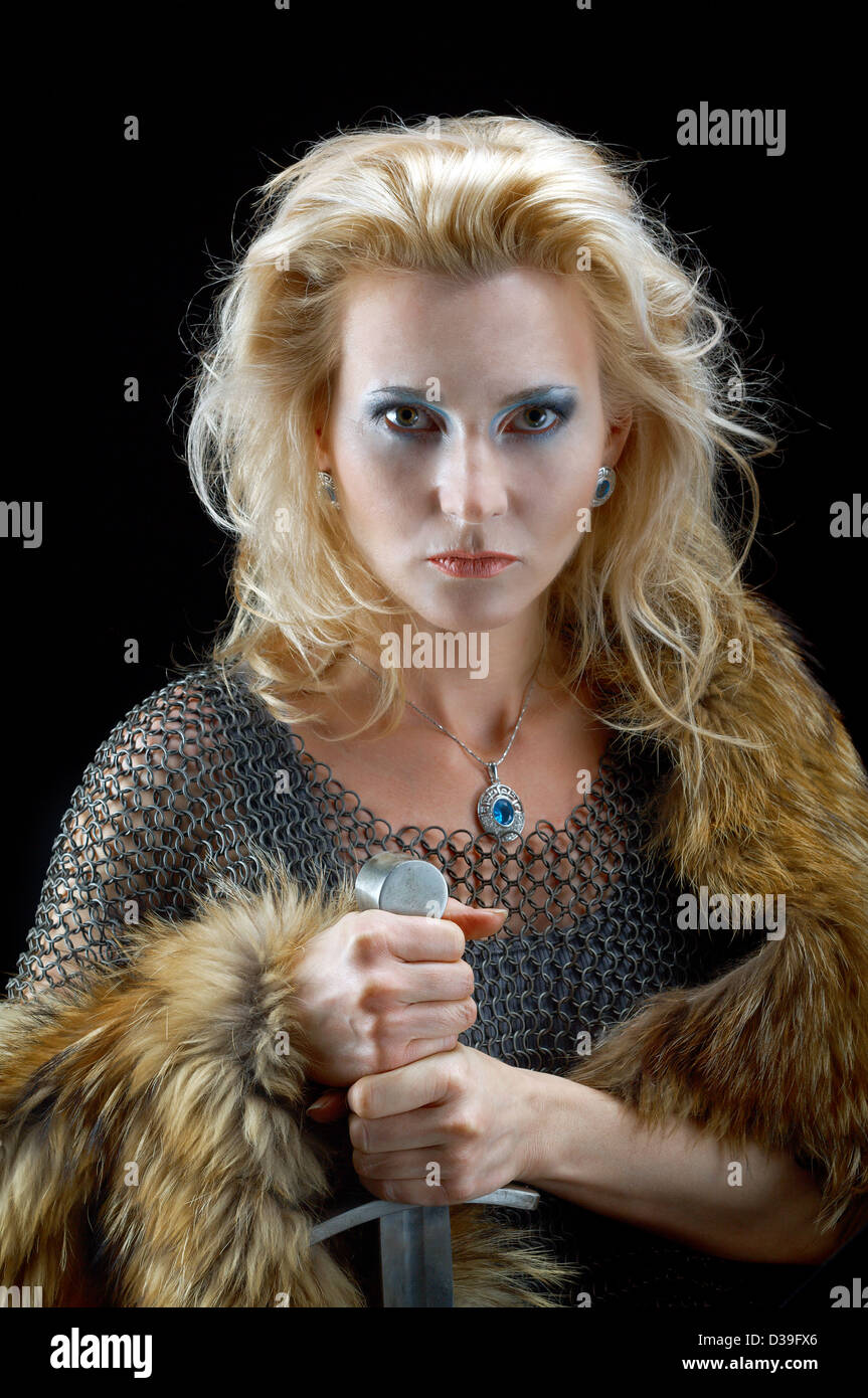 Valkyrie.Viking girl with sword Stock Photo