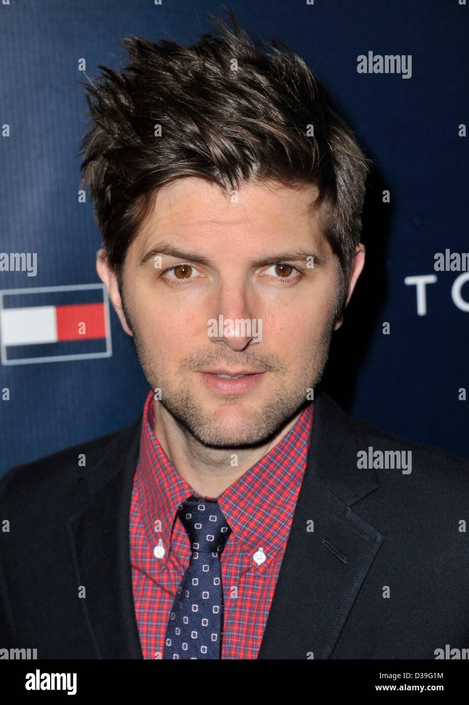 Los Angeles, California, USA. Adam Scott at arrivals for Tommy Hilfiger West Coast Flagship Store Opening, Tommy Hilfiger West Hollywood, Los Angeles, CA February 13, 2013. Photo By: Dee Cercone/Everett Collection/Alamy Live News Stock Photo