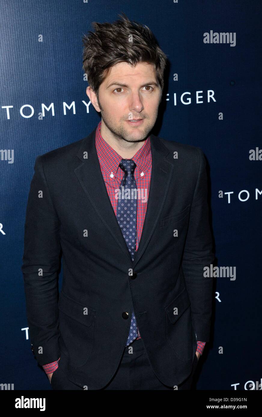 Los Angeles, California, USA. Adam Scott at arrivals for Tommy Hilfiger West Coast Flagship Store Opening, Tommy Hilfiger West Hollywood, Los Angeles, CA February 13, 2013. Photo By: Dee Cercone/Everett Collection/Alamy Live News Stock Photo