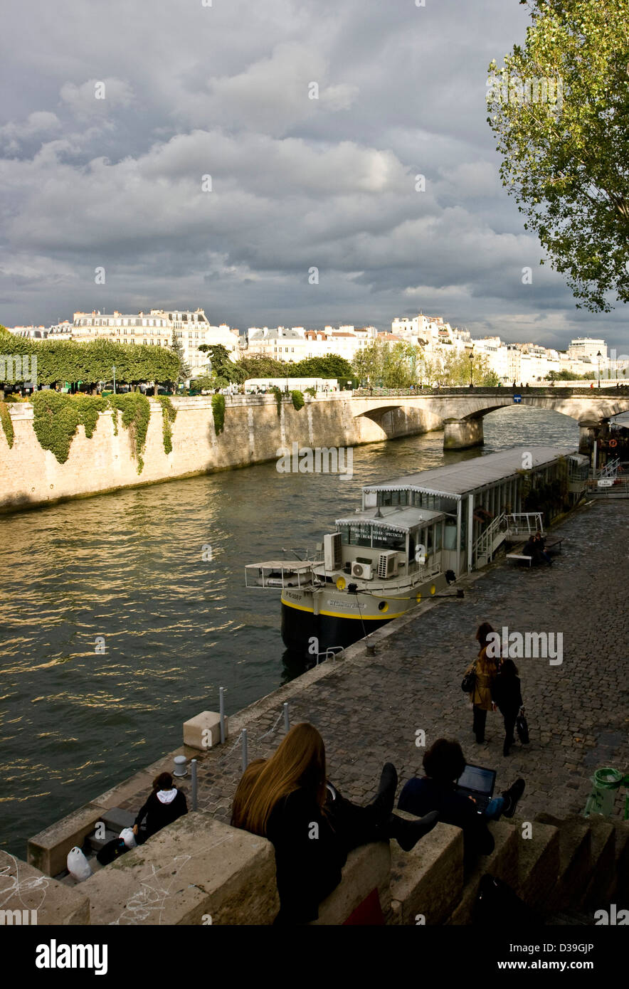 Sunset dusk light over river Seine and Paris France Europe Stock Photo