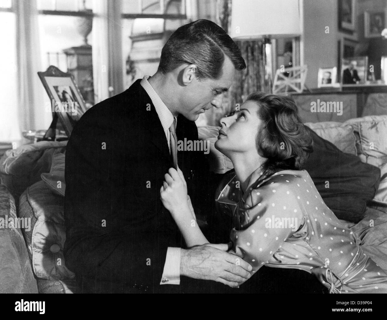 (dpa files) - Ingrid Bergman in the role of Anne Kalman looks into the eyes of her film partner Cary Grant alias Philip Adams in a movie scene of 'Indiscreet' (1958). Ingrid Bergman died 20 years ago on her 67th birthday on 29 August 1982 in London. The Swedish actress, born on 29 August 1915 in Sto Stock Photo