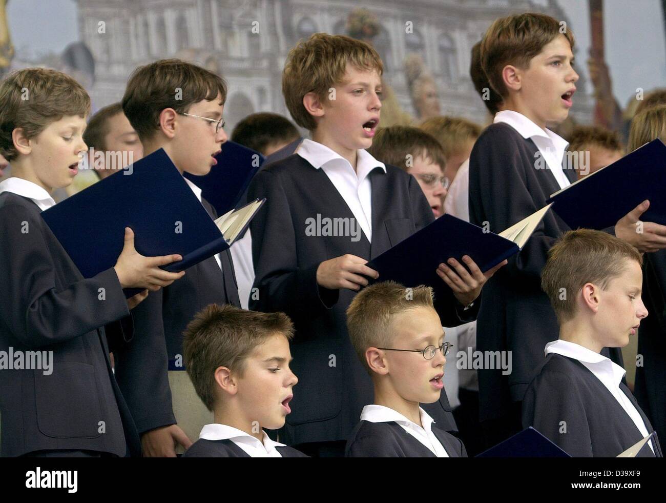 (dpa files) - The boys of the Kreuzchor (cross choir) of Dresden sing during a concert in Dresden, Germany, 18 August 2001. The history of the boys choir goes back to the 13th century. Today, 140 'Crucians' from the age of 9 to 19 sing in the choir. Stock Photo