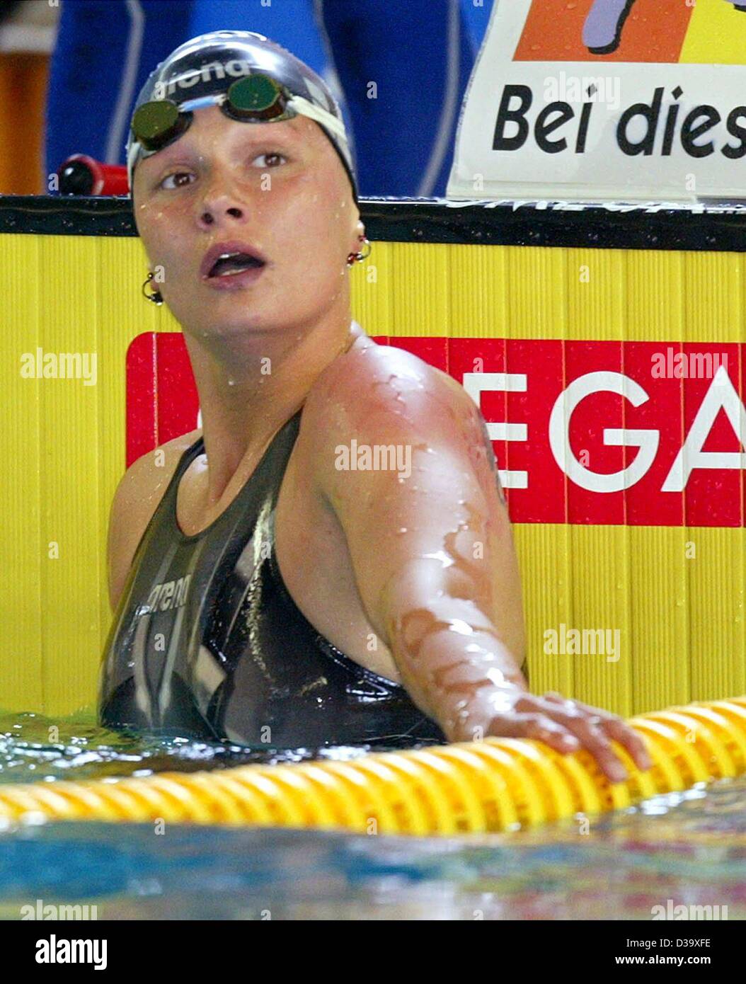 Franziska 'Franzi' van Almsick waits for the first results to be shown on the board at the German Swimming Championship in Warendorf, 26 May 2002. The 24-year-old German swimmer, Olympic champion of Barcelona, has been celebrating international victories since her teenage years and after a setback i Stock Photo