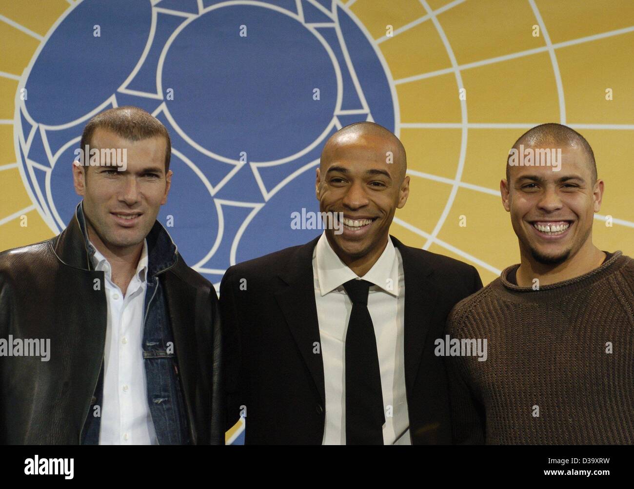 (dpa) - From L: The soccer players Zinedine Zidane from France, Thierry Henry from France, and Ronaldo from Brazil pose during the FIFA World Player Gala 2003 in Basel, Switzerland, 15 December 2003. Zidane was awarded the FIFA World Footballer award of the year 2003, Henry took second place and Ron Stock Photo
