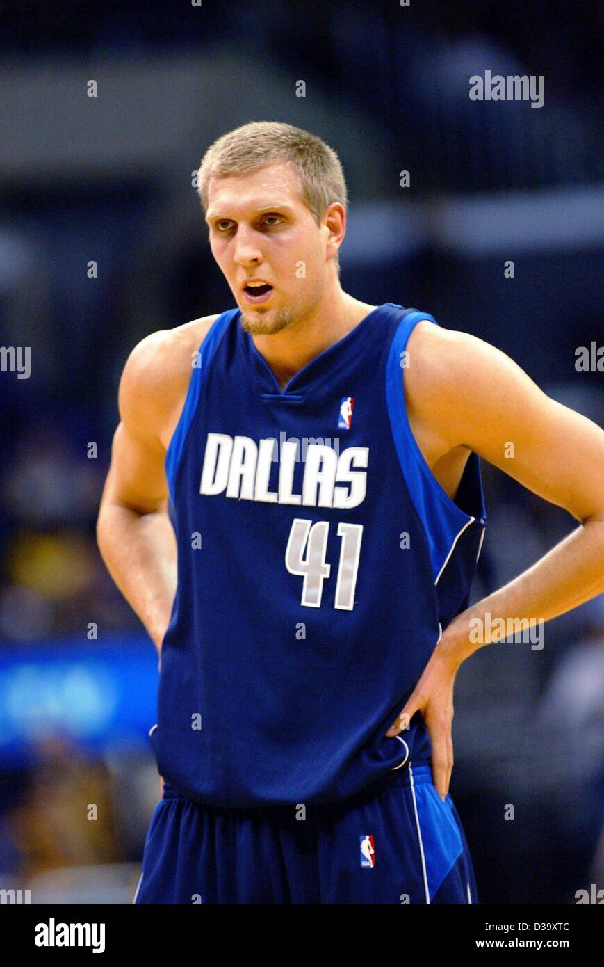 German basketball pro Dirk Nowitzki, who plays for the Dallas Mavericks, appears exhausted during the NBA championship match between Dallas Mavericks and Los Angeles Lakers in Los Angeles, California, USA, 13 December 2003. Stock Photo