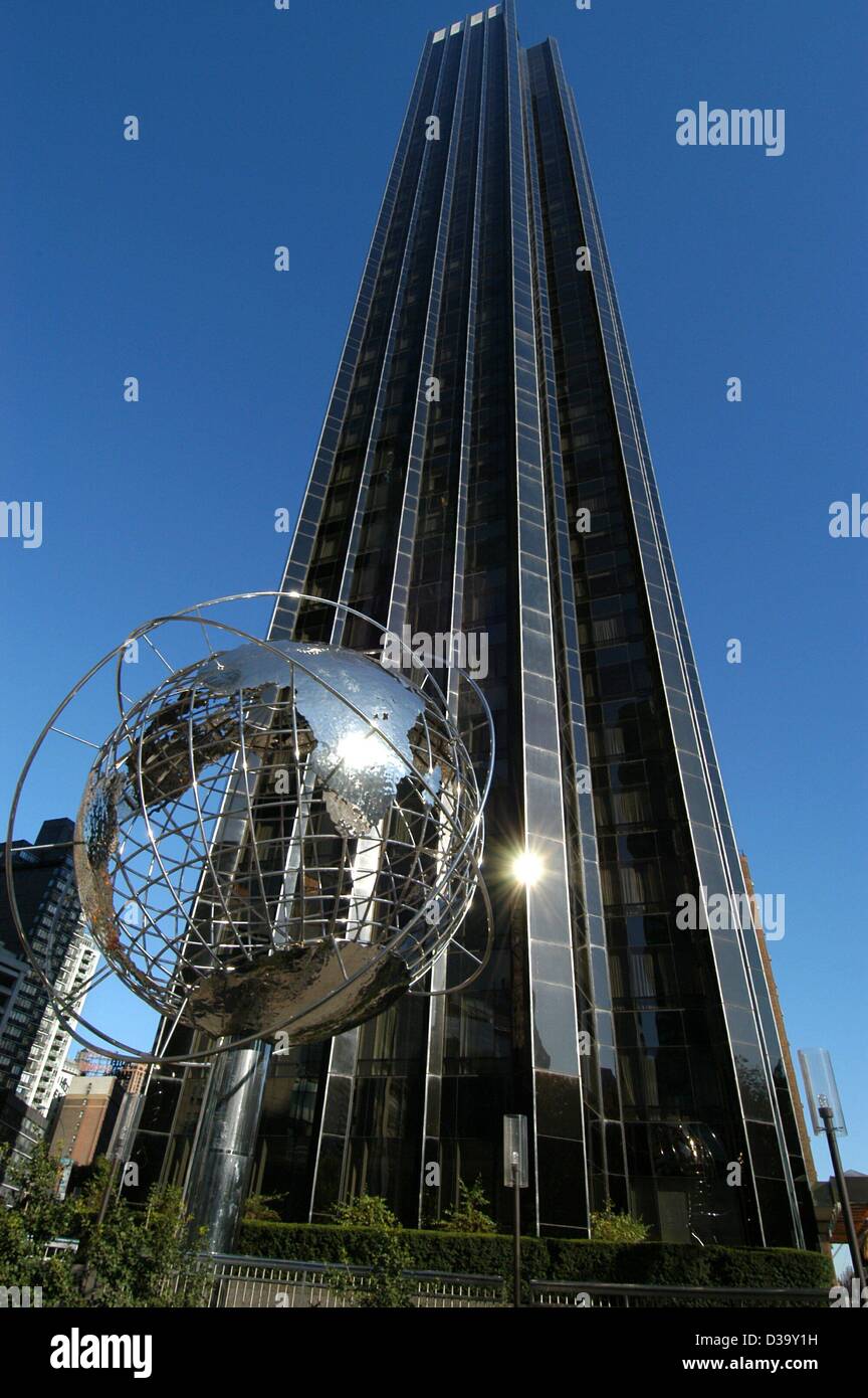 (dpa) - A glaring globe stands in front of the towering Trump Tower near the Columbus Circle at the corner of 59th street and Central Park West in New York, United States, 9 November 2003. This impressive building is not to be confused with larger and better known building with the same name which i Stock Photo