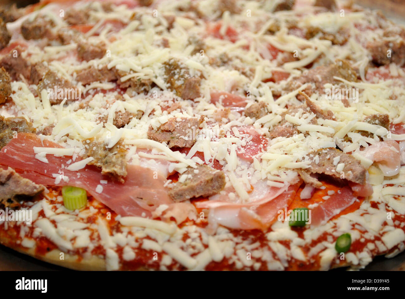 Raw Meat Pizza Covered with Cheese Stock Photo Alamy