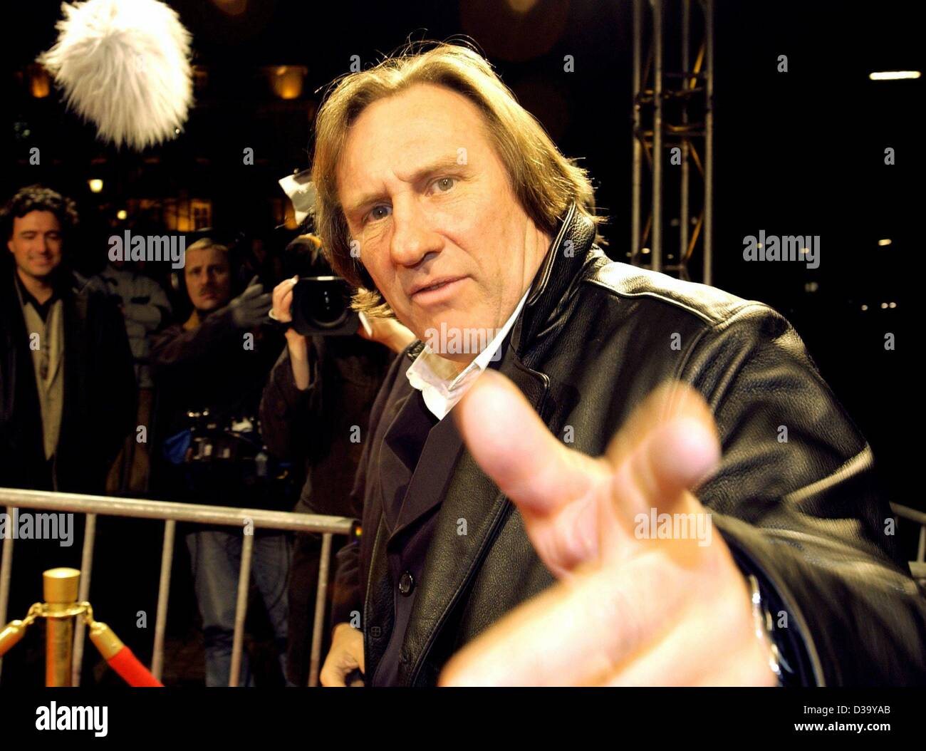 (dpa) - French actor Gerard Depardieu arrives to the German first night screening of his new film 'Asterix & Obelix - Mission Cleopatra' in Hamburg, 1.3.2002. 53-year-old Depardieu who stars again as Obelix said the two of them have much in common: Both love to eat, love people and love to play with Stock Photo