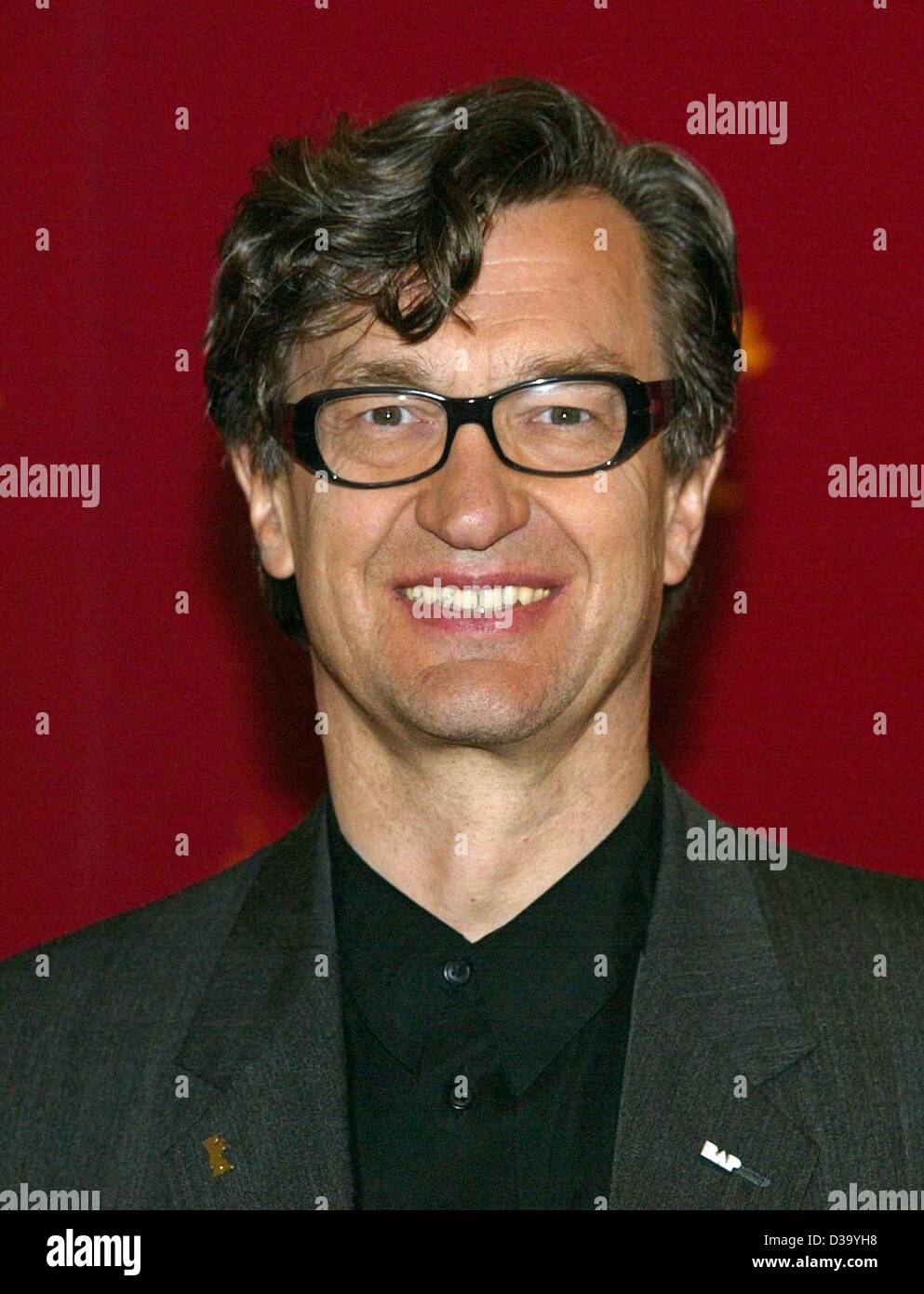 (dpa) - Berlinale: German film director Wim Wenders ('Paris, Texas')  presents his new film 'Ode to Cologne', a nostalgic documentary about the 20-year career of the popular German rockband BAP from Cologne, at the 52. International Film Festival in Berlin, 13.2.2002. The movie is shown at the Berli Stock Photo