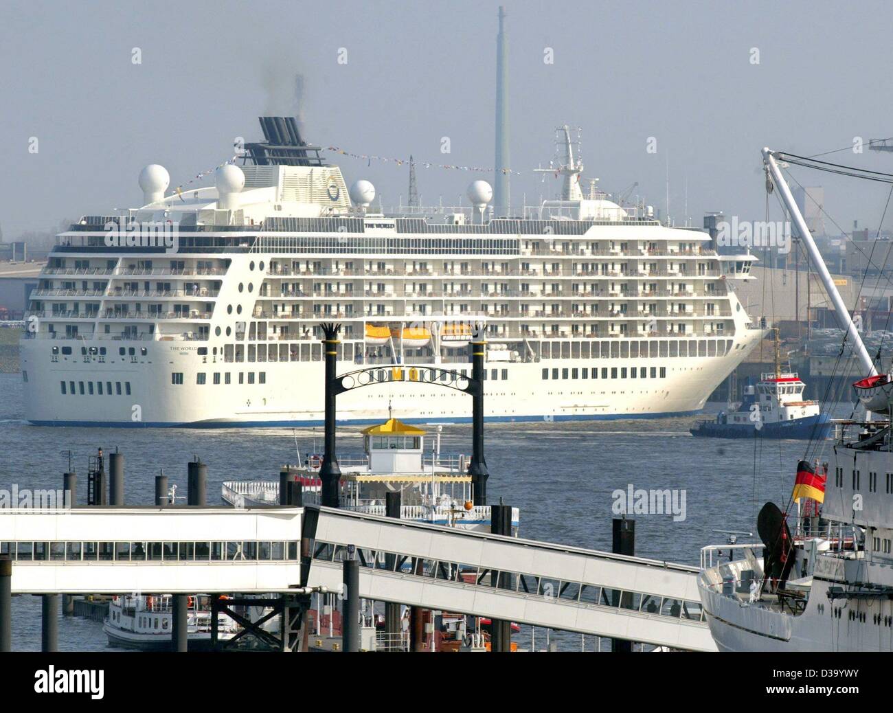 (dpa) - The luxury liner 'World of ResidenSea', the first apartment cruiser in the world, is entering the Hamburg harbor, 3 April 2002.  The ship, which sails under the flag of the Bahamas, is on its maiden voyage. It is 200 m long and has 88 suites to rent and more than 110 appartments for sale at  Stock Photo