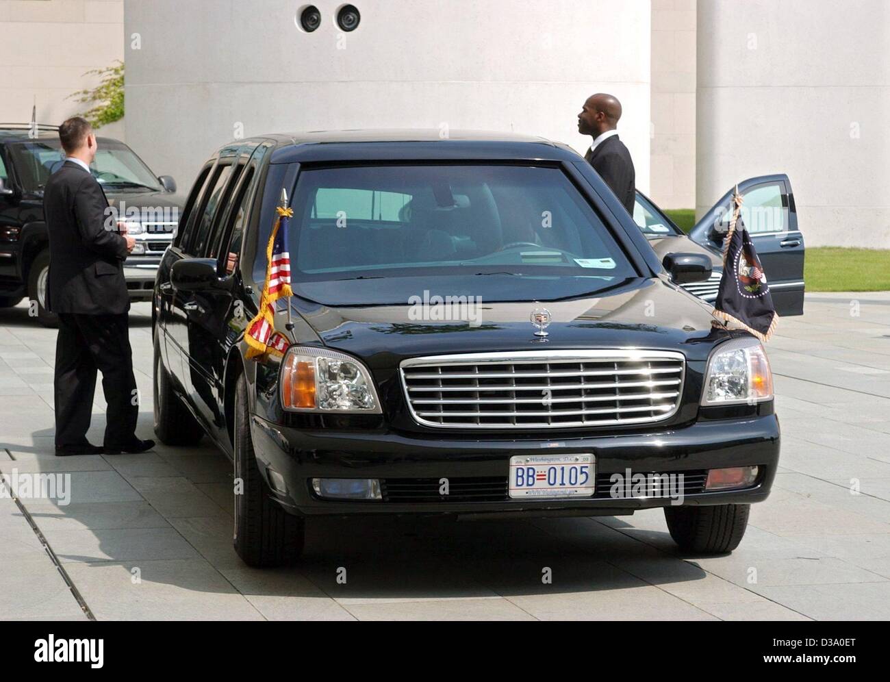 (dpa) - The bullet-proof limousine of US president Bush, waits in front of the chancellor's office, the 'Kanzleramt' in Berlin, 23 May 2002. Bush came on a one-week visit to Europe, the 24-hour stay in Germany being his first stop. The car is part of his travelling entourage. Stock Photo