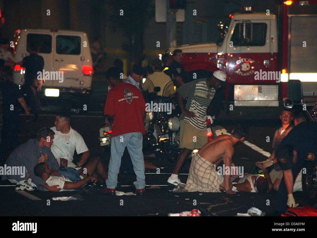 (dpa files) - Medical attendants are giving first aid to the victims of a bomb attack during the Summer Olympic Games in Atlanta, 27 July 1996. Two people were killed, 111 injured. The Games, however, were not cancelled. Stock Photo