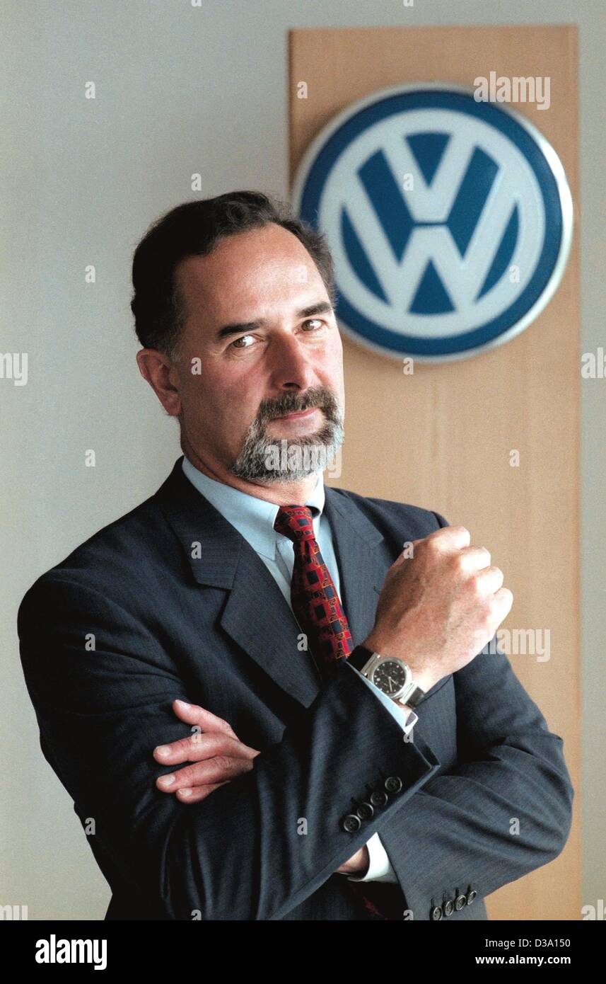 (dpa) - Bernd Pischetsrieder, the new chairman of the management board of the German automotive group Volkswagen, poses in front of VW's corporate logo (undated). Pischetsrieder took over the post in April 2002. As VW board member, Pischetsrieder was responsible for the group's quality assurance. Up Stock Photo