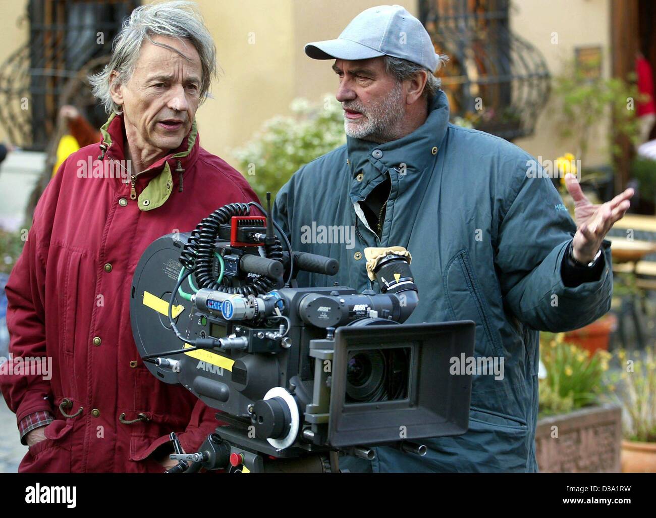 (dpa) - German film director Edgar Reitz (R) working with his director of photography Thomas Mauch on a new sequel of his TV series 'Heimat' in Oberwesel, Germany, 5 April 2002. Reitz won international fame with his first sequels of 'Heimat' (homeland). Stock Photo