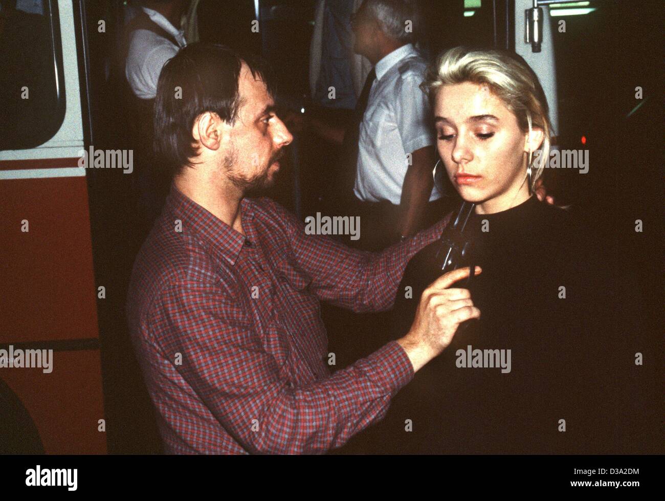 (dpa files) -  Dieter Degowski holds the hostage Silke Bischoff at gunpoint after they robbed a bank in Gladbeck-Rentfort, Germany, 17 August 1988. During the hostage crisis the bank robbers killed two hostages and a policeman died in a chase. The police stopped the gangsters by force of arms on the Stock Photo