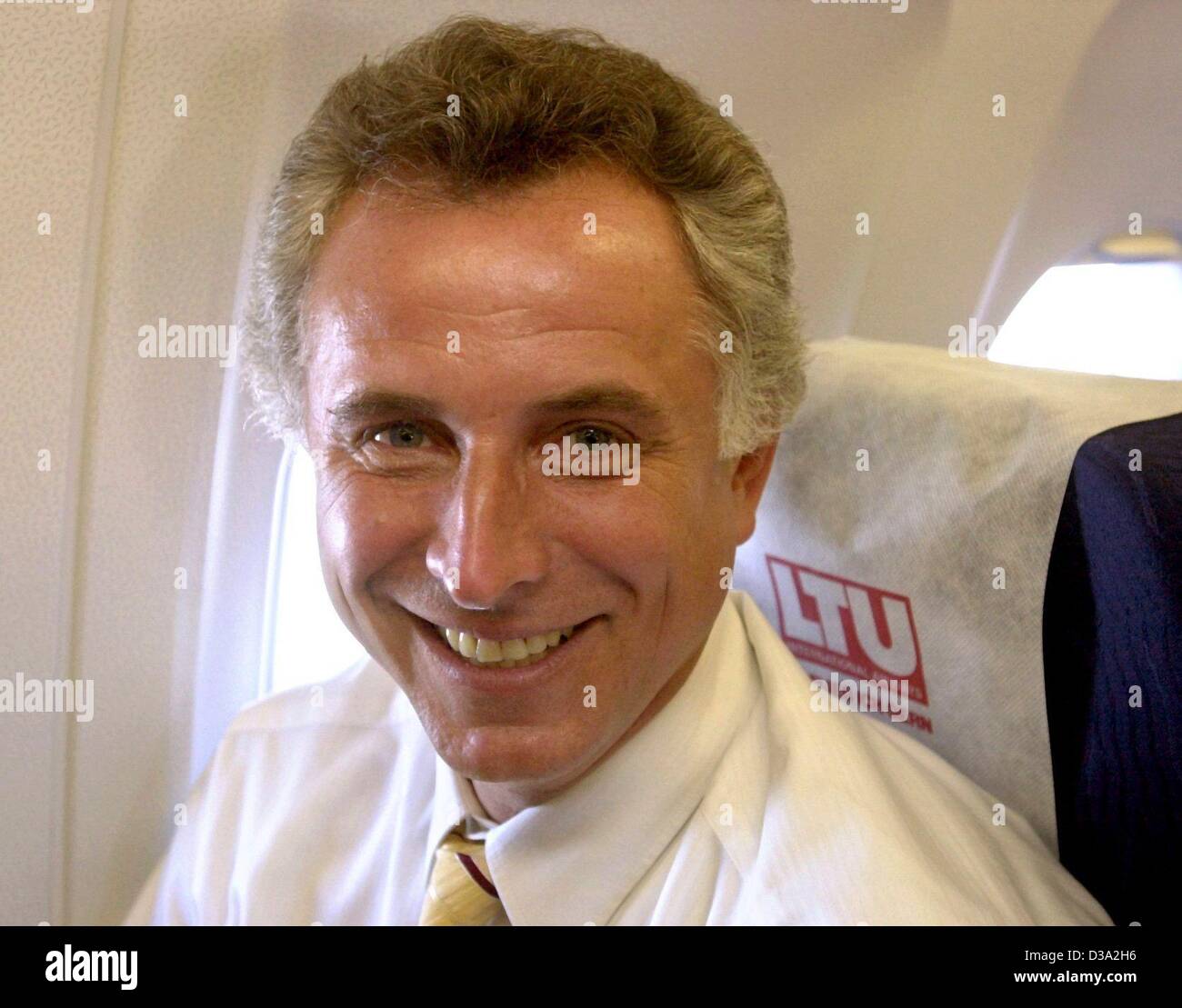 (dpa) - Juergen Marbach, managing director of the airline LTU, sits in a new airbus of the airline in Toulouse, France, 10 April 2002. Stock Photo
