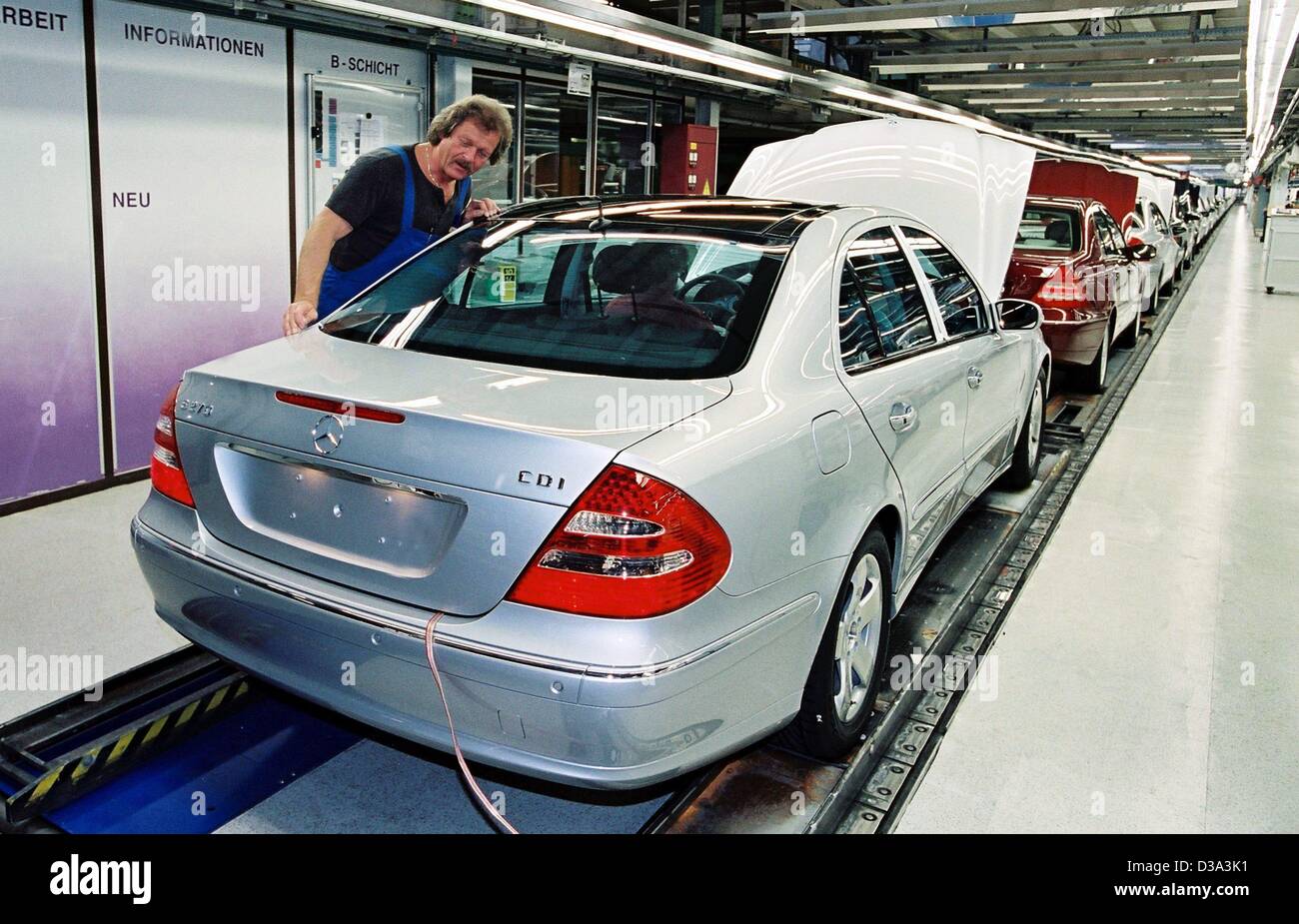 (dpa) - A worker checks the new E-Class Mercedes-Benz in the Mercedes-Benz factory in Stuttgart (undated handout). Stock Photo