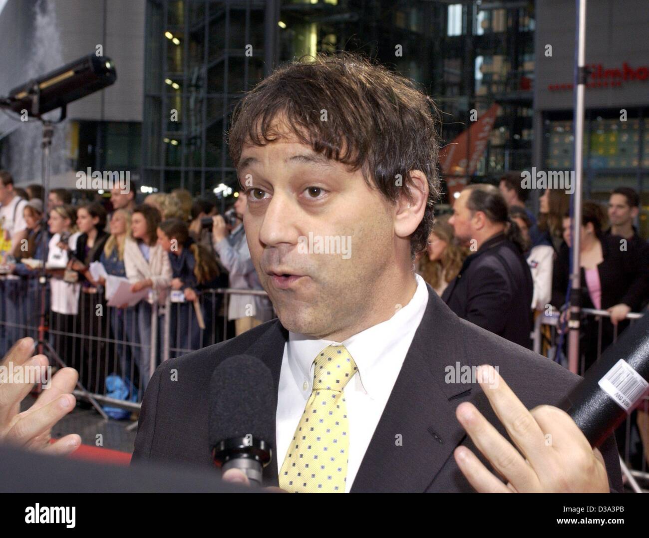 (dpa) - Director Sam Raimi answers journalist's questions as he arrives at the German premiere of his new film 'Spider-Man' in Berlin, 27 May 2002. 'Spider-Man', a record winning blockbuster in the US, will cast his net at the movies in Germany from 6 June 2002. Stock Photo