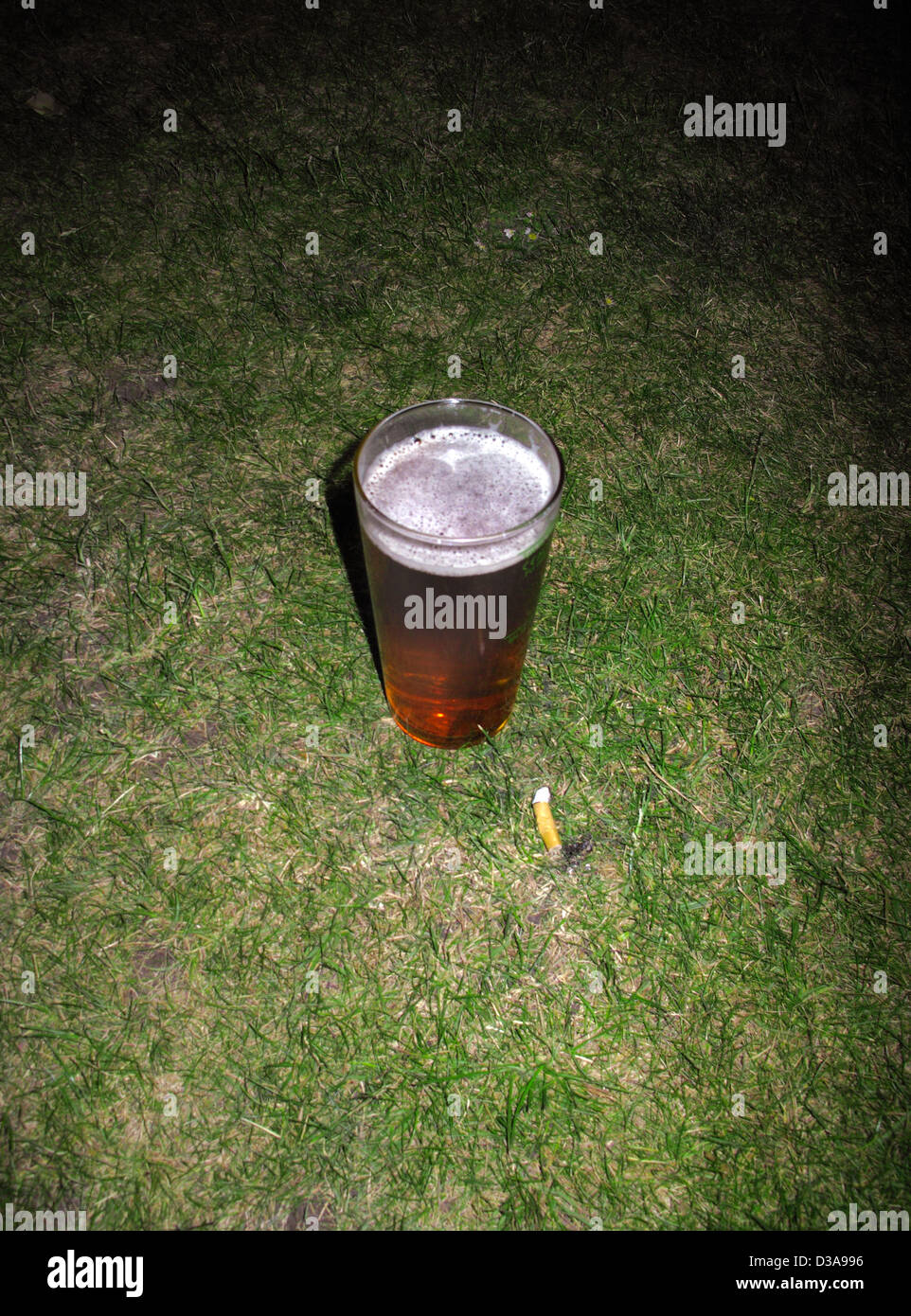 Beer On Grass At Night Stock Photo Alamy