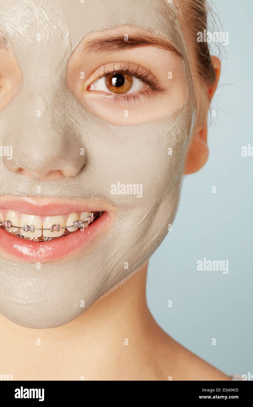 Smiling girl wearing face mask Stock Photo Alamy