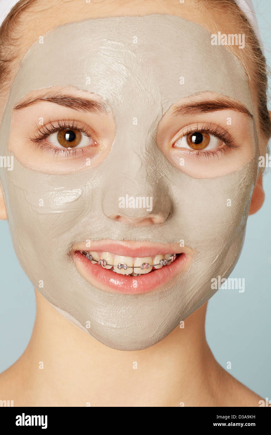 Smiling girl wearing face mask Stock Photo Alamy