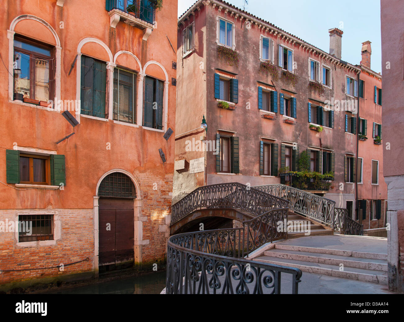 Apartment buildings and bridge on canal Stock Photo Alamy