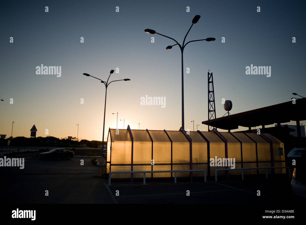 Shopping center parking in the sunset. Stock Photo