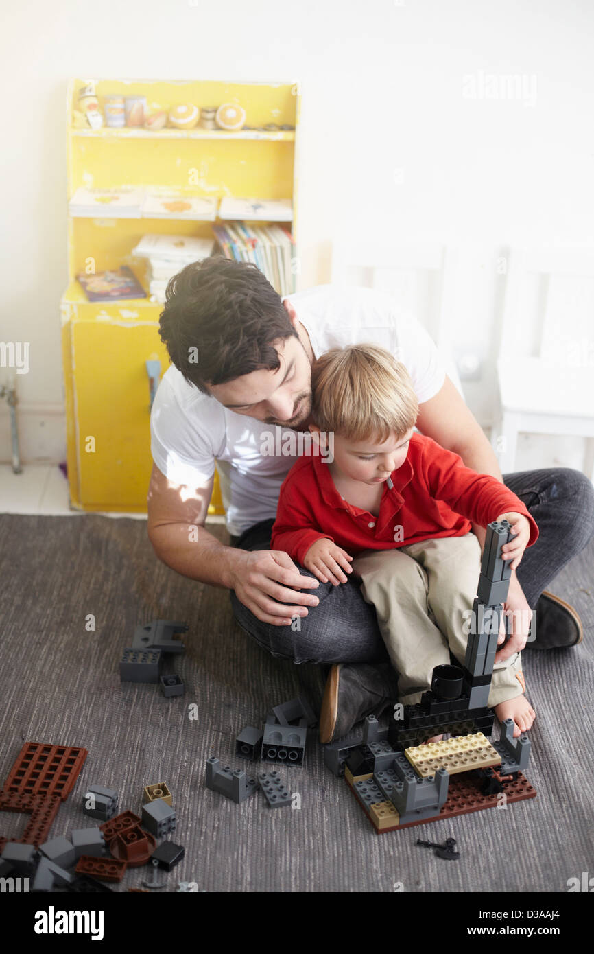 Father and son building with blocks Stock Photo Alamy