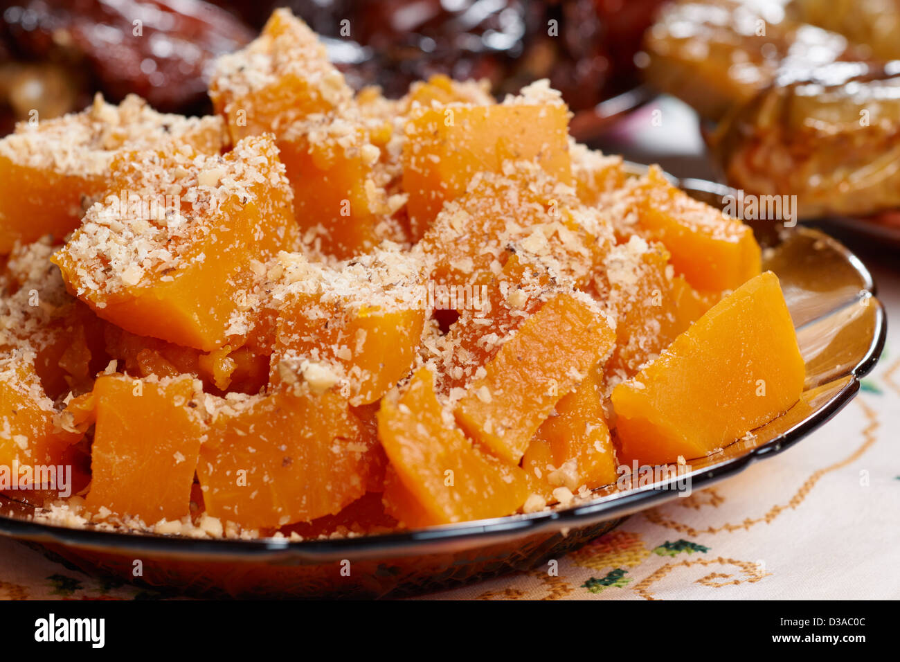 Traditional Bulgarian Christmas vegetarian food boiled pumpkin on holiday table Stock Photo