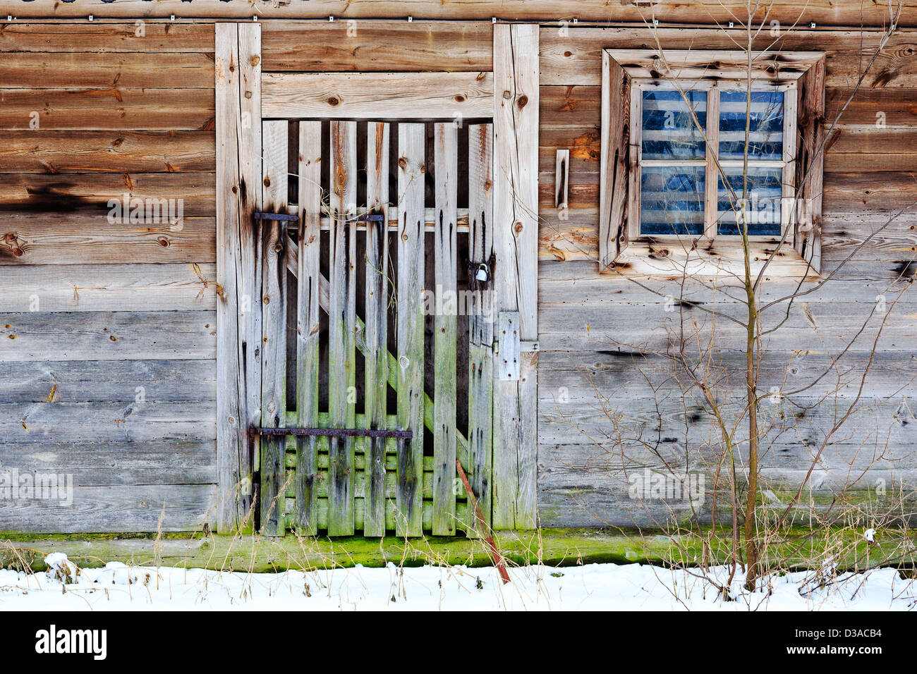Old door and window of wooden building Stock Photo - Alamy