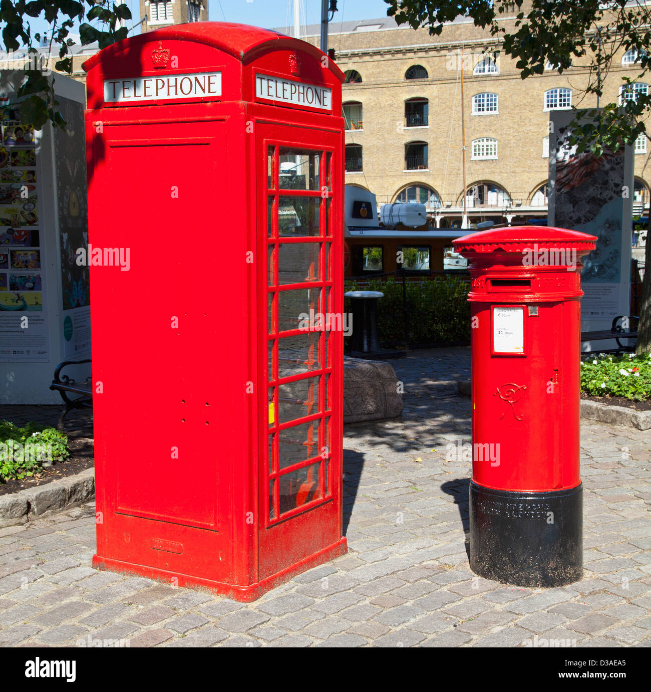 A traditional red English public phone and post box Stock Photo
