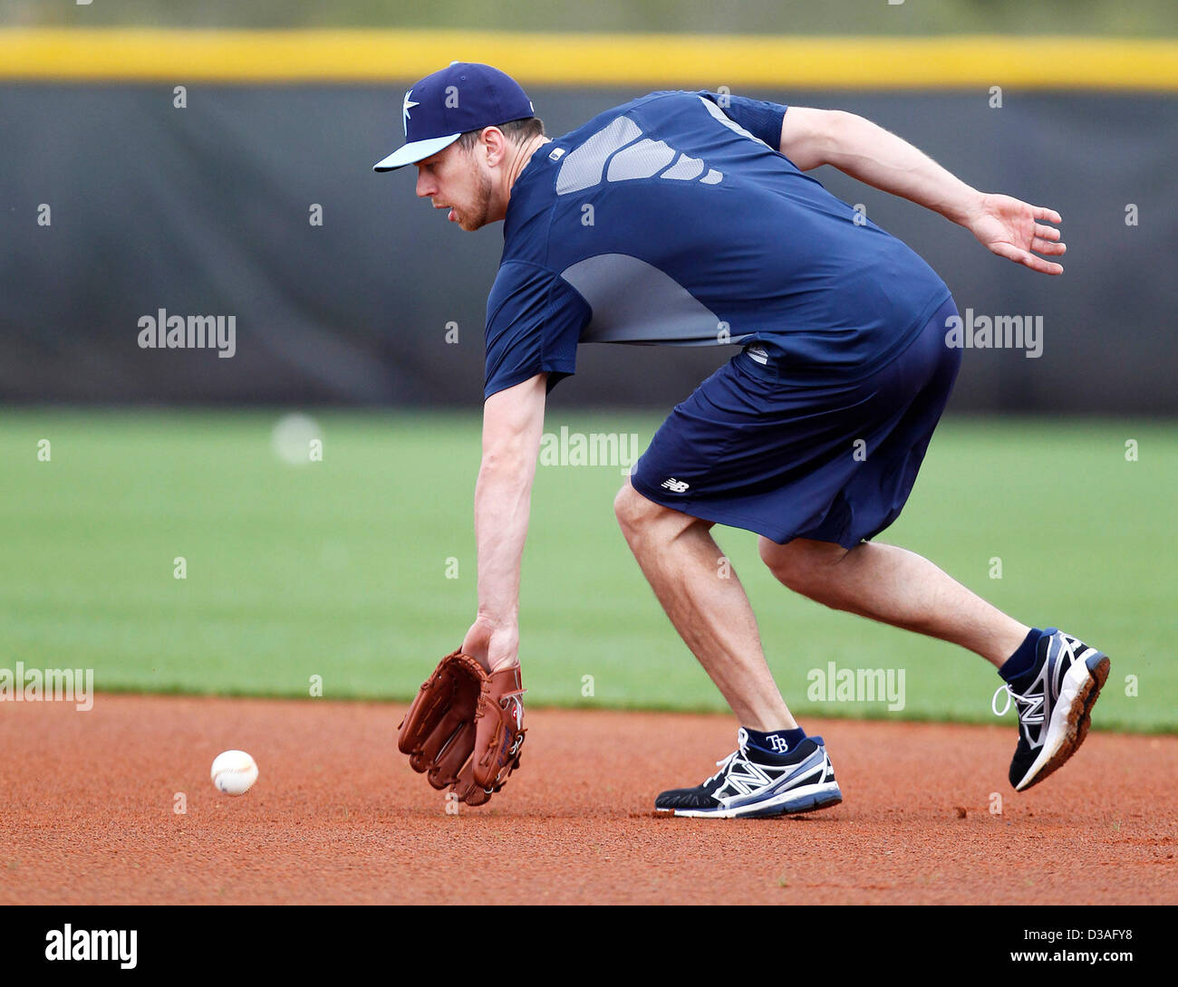 Feb. 14, 2013 - St. Petersburg, Florida, U.S. - JAMES BORCHUCK   |   Times .Ben Zobrist fields some ground balls at the Tampa Bay Rays spring training facility Thursday morning in Port Charlotte, FL. (Credit Image: © James Borchuck/Tampa Bay Times/ZUMAPRESS.com) Stock Photo
