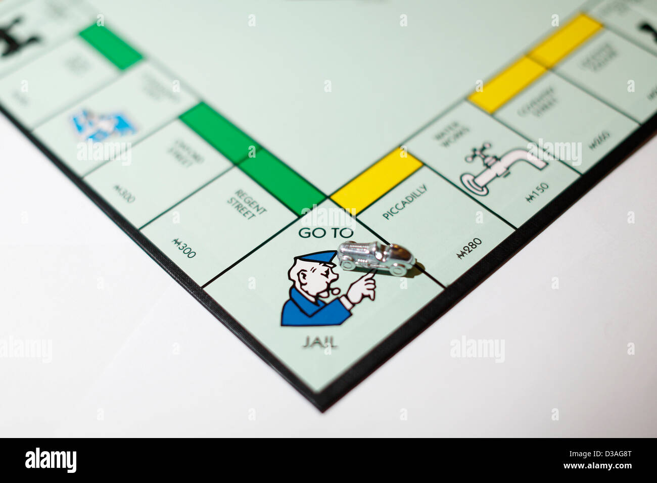 Go to jail on Monopoly board game. Stock Photo