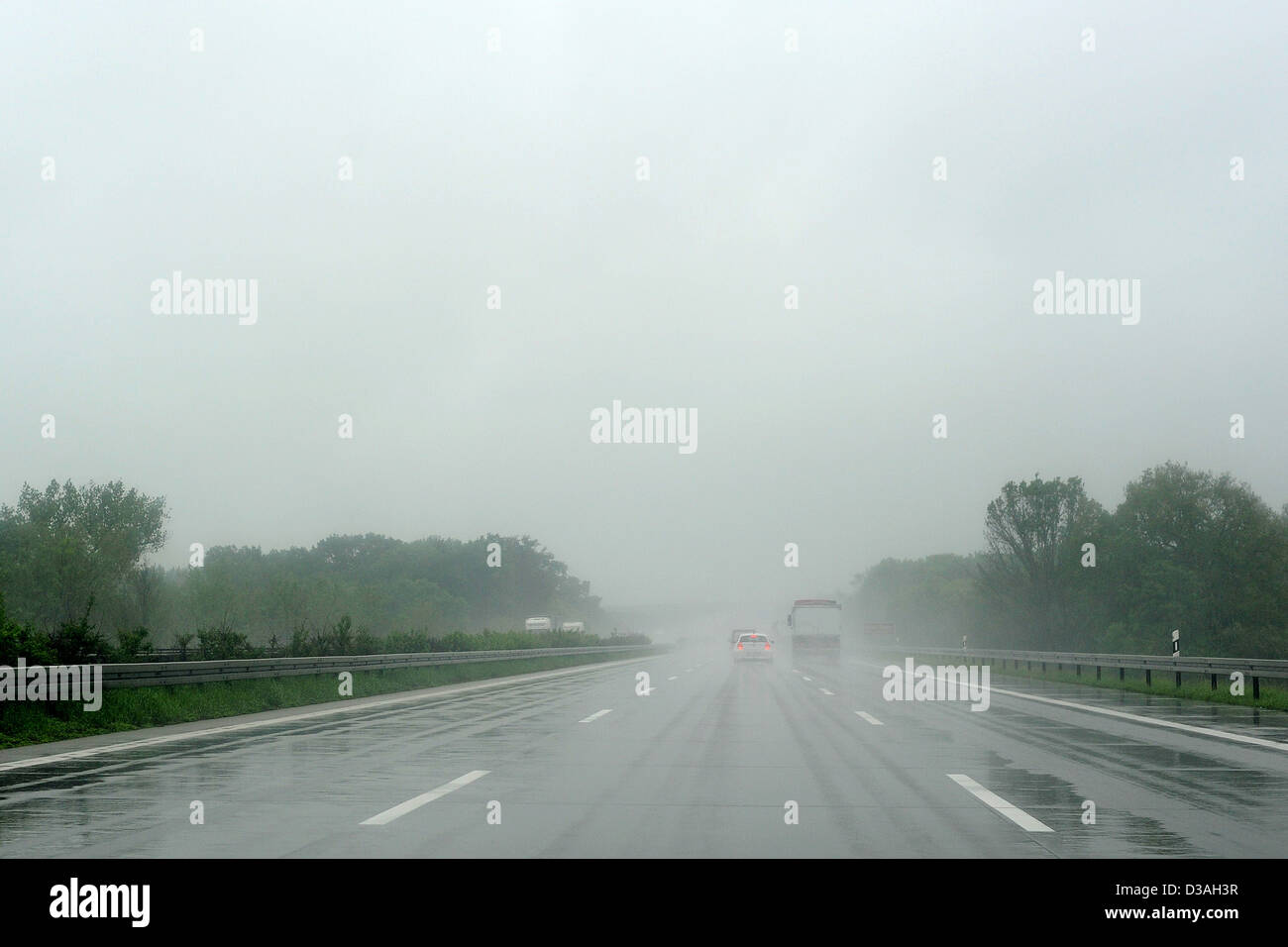 Leipzig, Germany, on the rain-slicked road motorway A9 Stock Photo