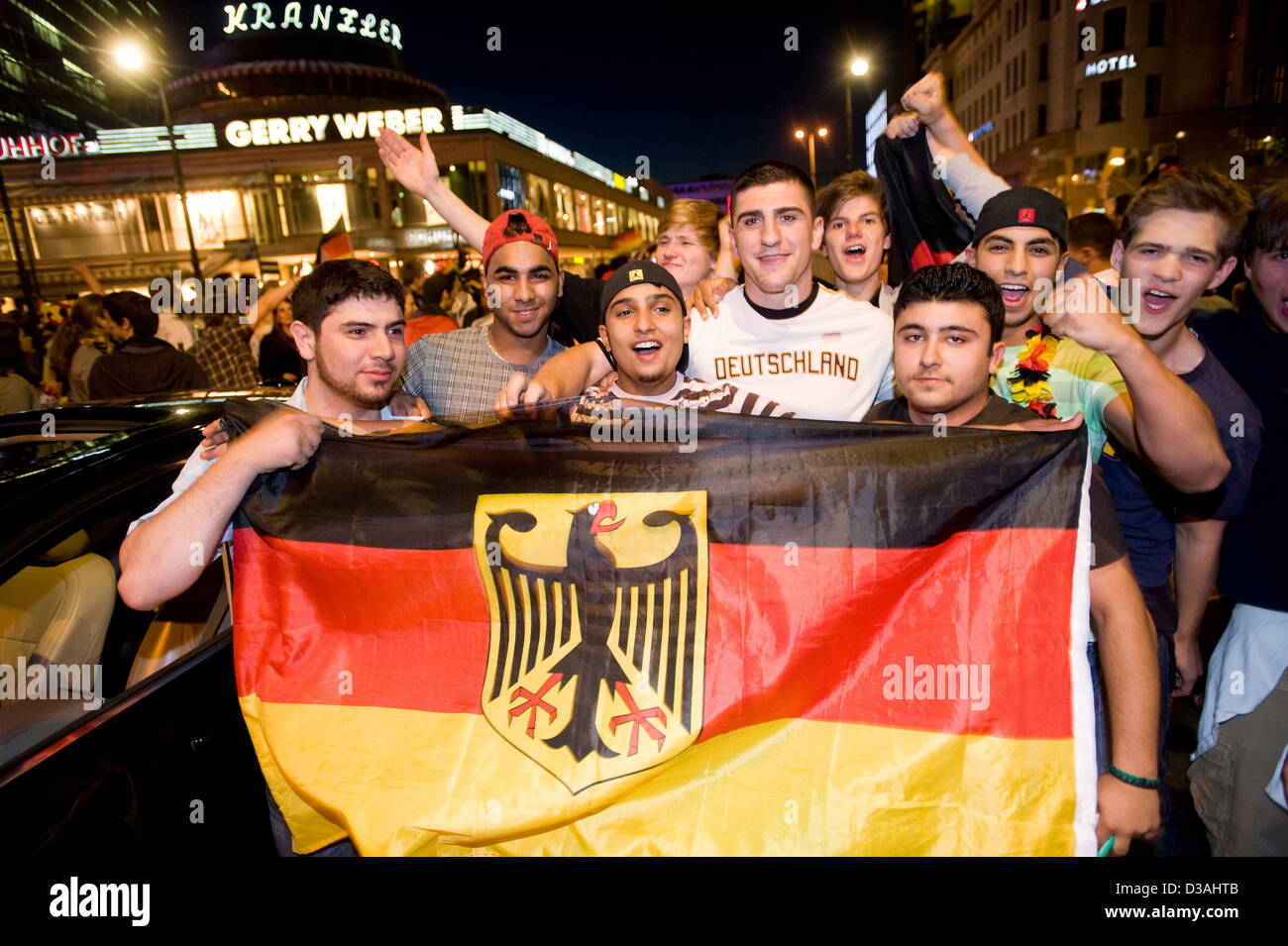 Berlin, Germany, soccer fans celebrate the first round victory for Germany Stock Photo