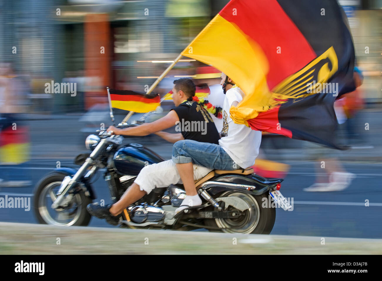 Berlin, Germany, fans on the motorcycle with Germany flag Stock Photo