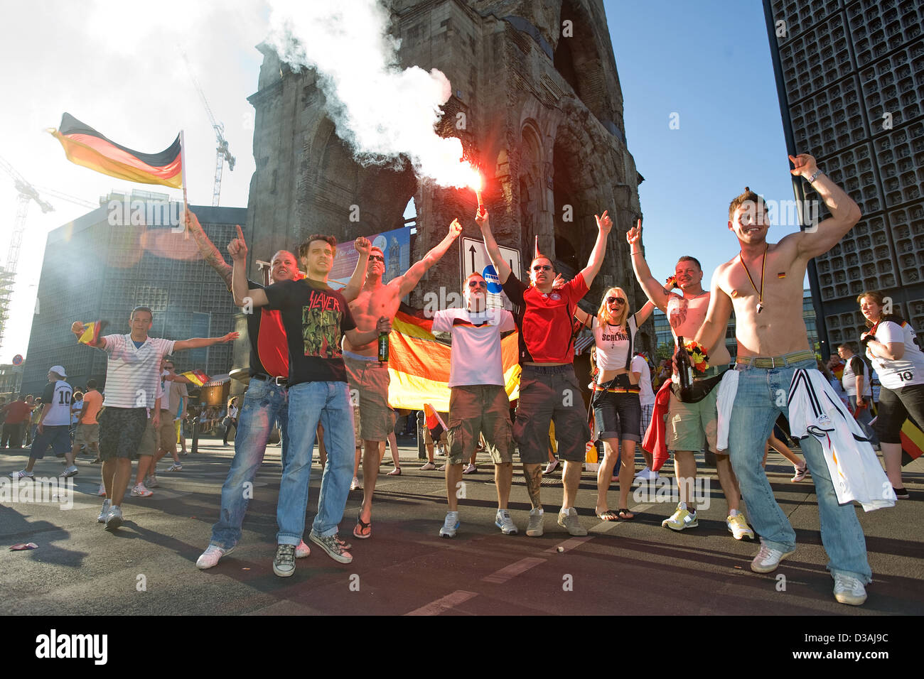 Berlin, Germany, with football fans cheer after the Bengal flare knockout victory Stock Photo