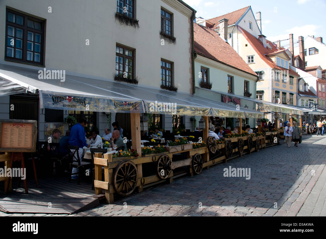 A row of restaurants on Meisttaru Iela in Riga old town, Riga, Latvia, Baltic States Stock Photo