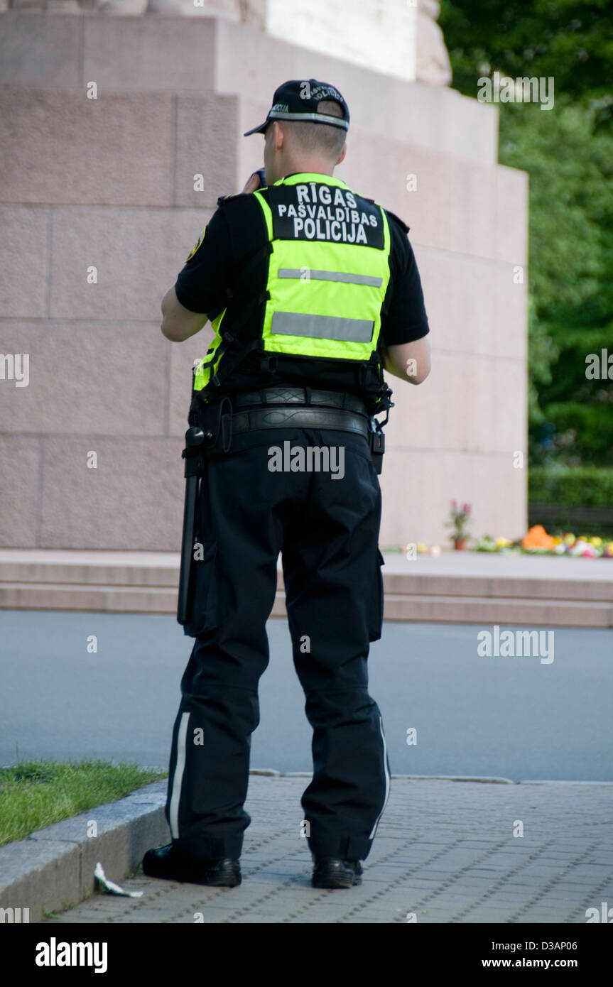 A Riga police officer on duty in Riga Old Town,Riga, Latvia, Baltic Staes  Stock Photo - Alamy