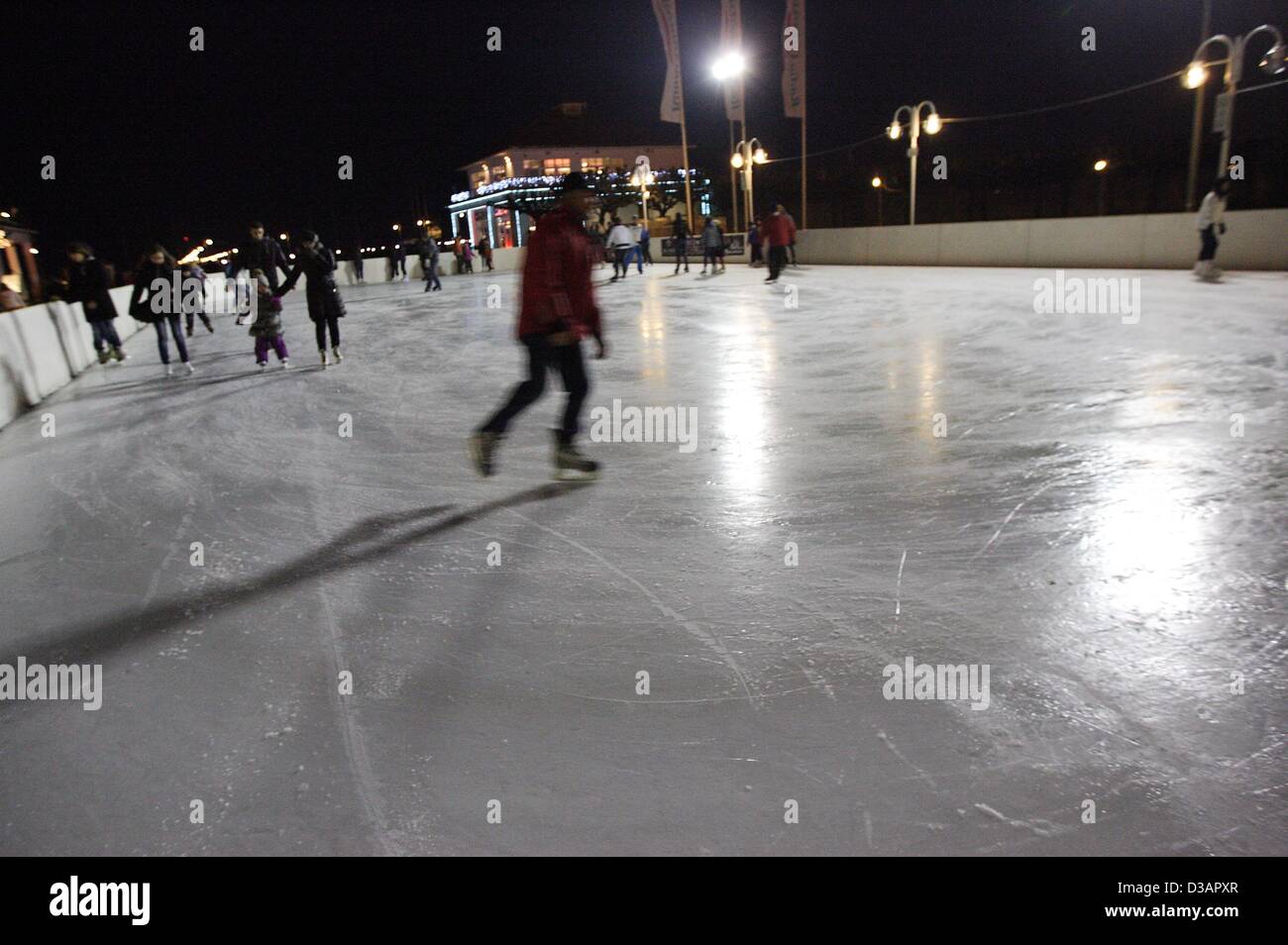 Sopot, Poland 14th, February 2013   Sopot's citizens enjoy ice skiting on the open-air skiting rink  near the Sopot's Pier. Stock Photo