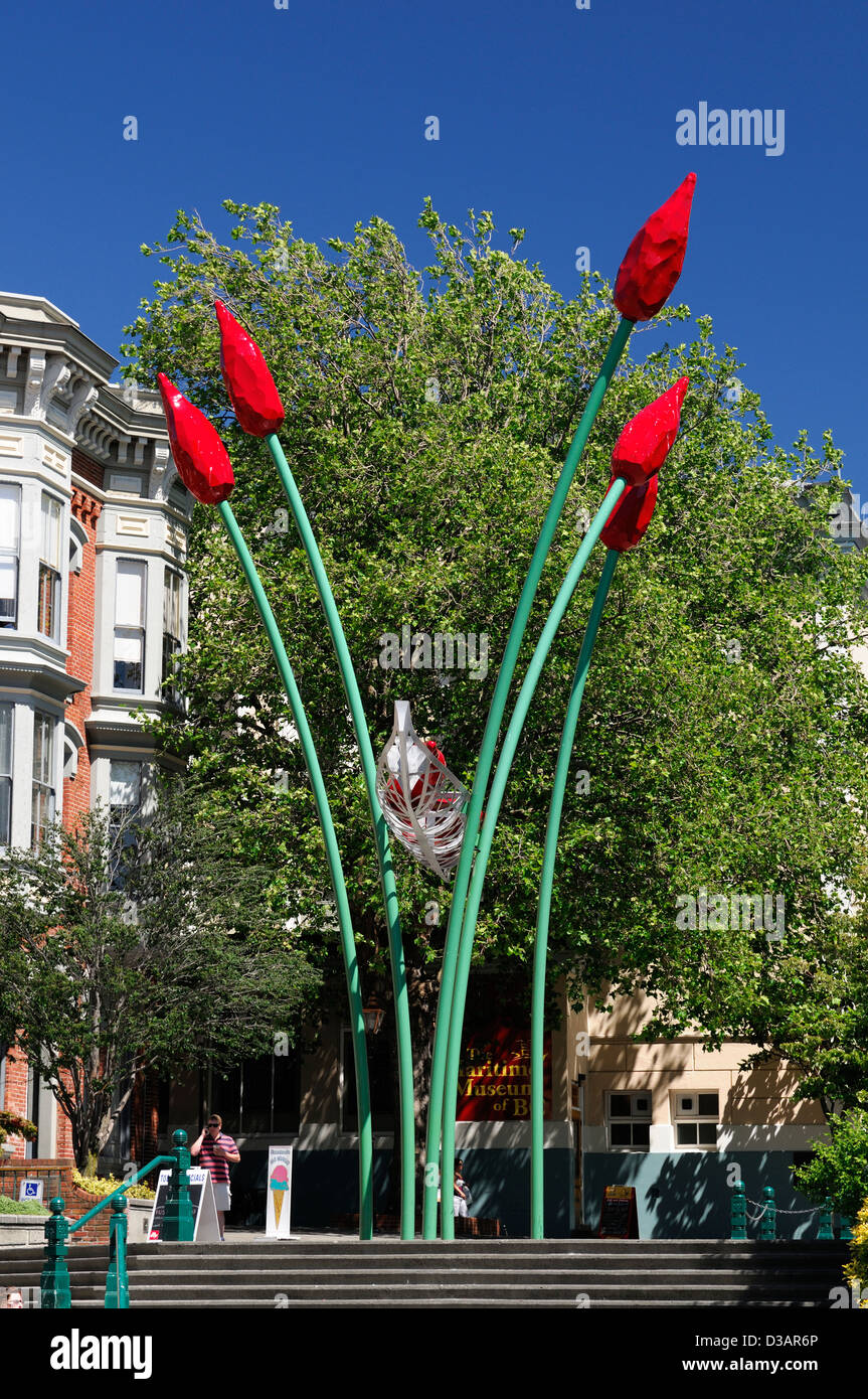 red tulip sculpture art artwork tall stemmed stems stem flowers ornate inner harbour victoria vancouver island Stock Photo