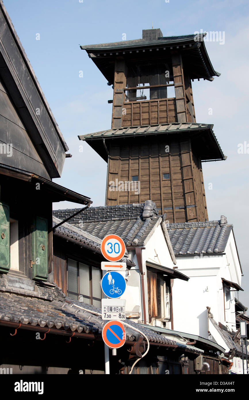 February 14, 2013, Kawagoe, Japan - The 16 meter Toki no Kane (Time Bell Tower) is the symbol of Kawagoe from the beginning of Edo Period. An old town from Edo Period (1603-1867) is located in Kawagoe, 30 minutes by train from central Tokyo. In the past Kawagoe was an important city for trade and strategic purpose, the shogun installed some of their most important loyal men as lords of Kawagoe Castle. Every year 'Kawagoe Festival' is held in the third weekend of October, people pull portable shrine during the parade, later 'dashi' floats on the streets nearby. The festival started 360 years ag Stock Photo