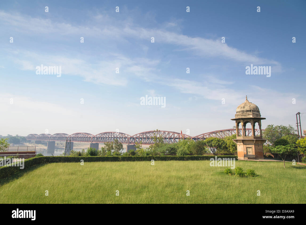 Green park and bridge under blue sky Stock Photo - Alamy