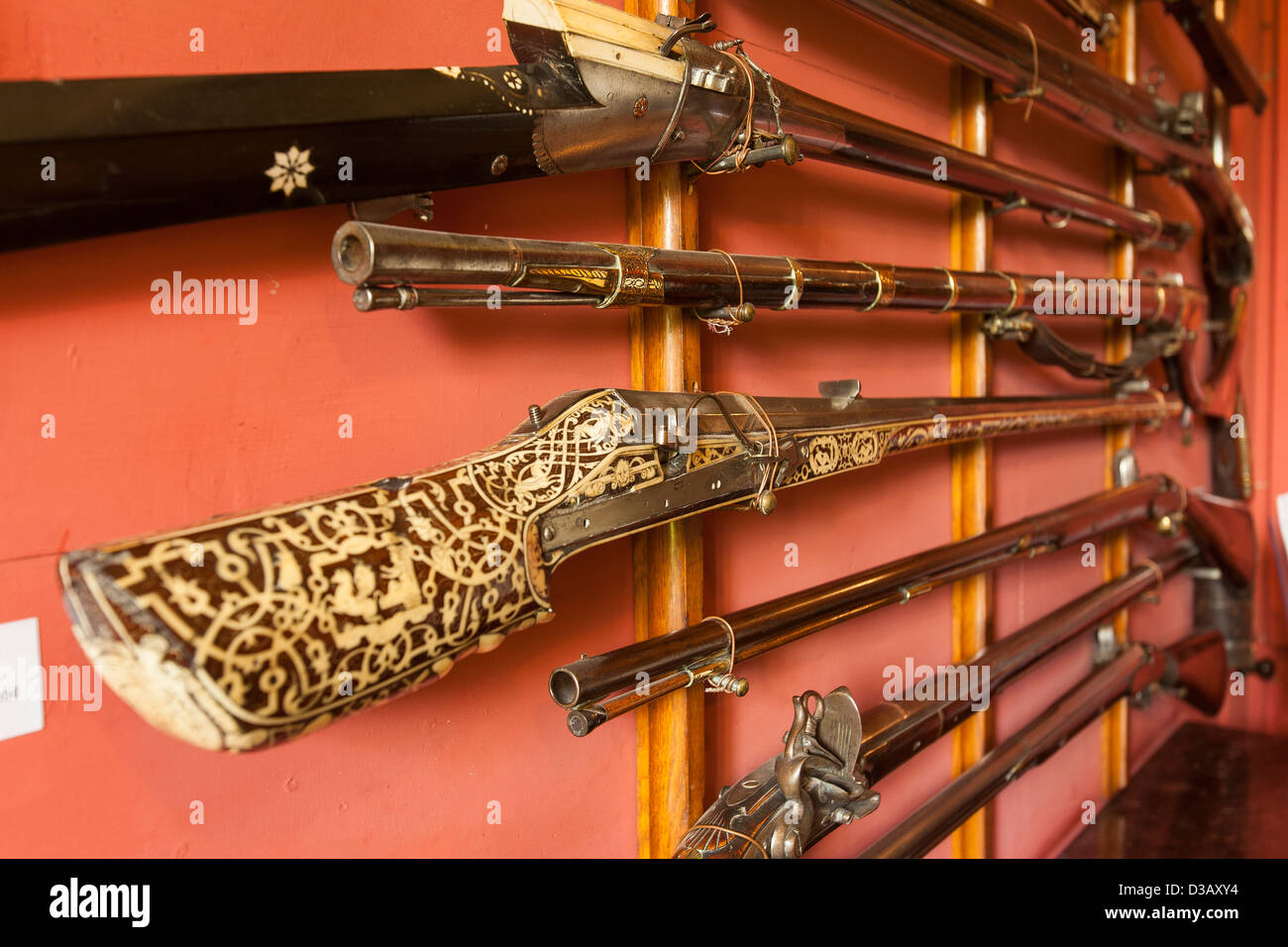 Part of the gun collection in a passage in Abbotsford House  The was the home of Walter Scott. Historic Scotland Stock Photo