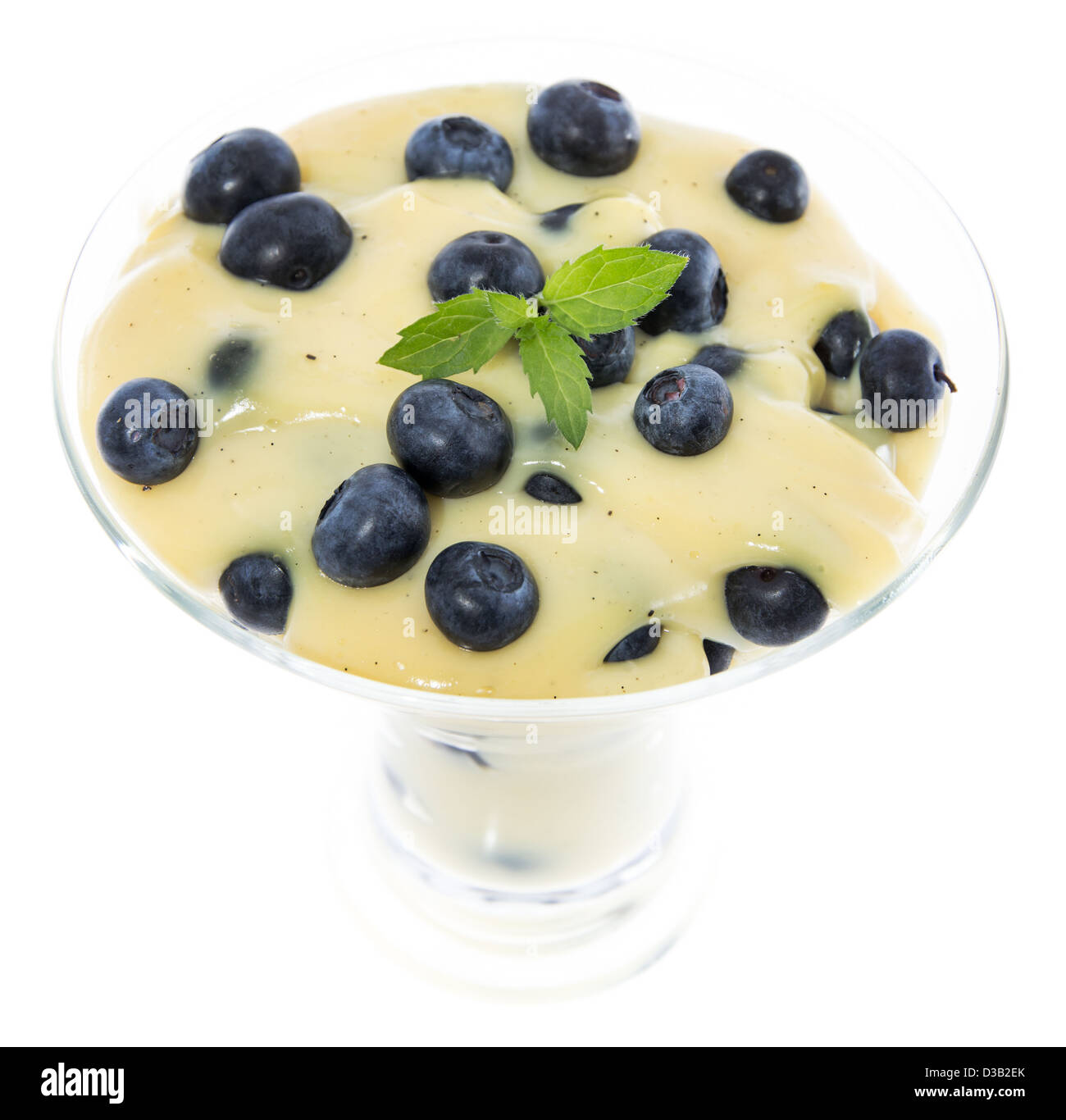 Portion of Blueberry Pudding (isolated on white) Stock Photo