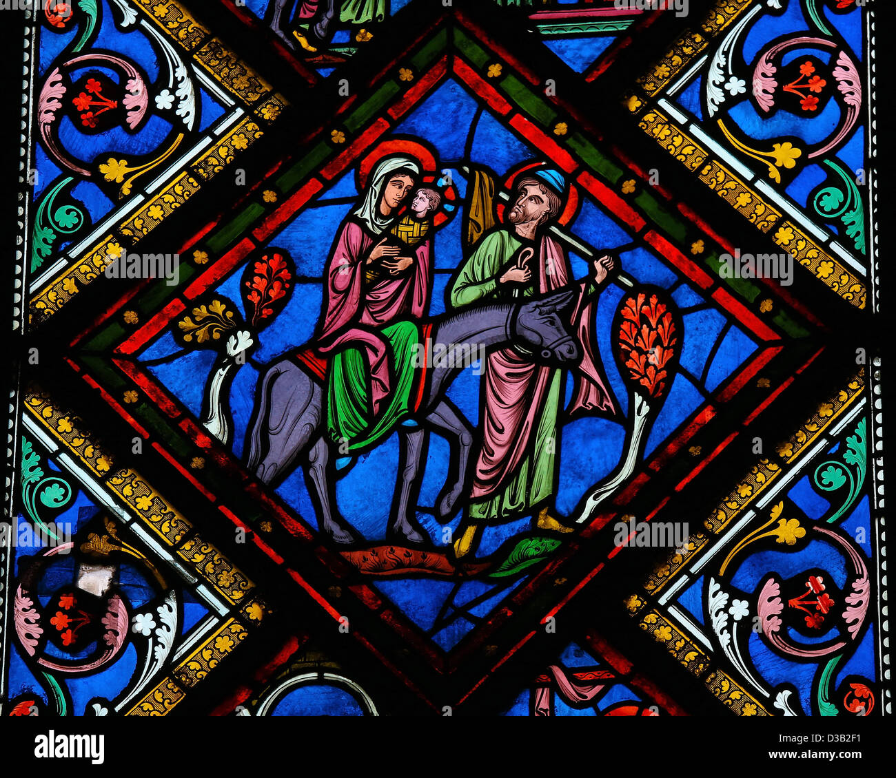 Stained glass window depicting the Holy Family in Bethlehem Stock Photo